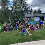 Family, friends and loved ones gather in front of the Mazurkiewicz home to show their support for the memorial motorcade that featured more than 200 bikes.